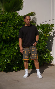 ʻANO KĀPALA OLIVE & ORANGE BOARDSHORTS