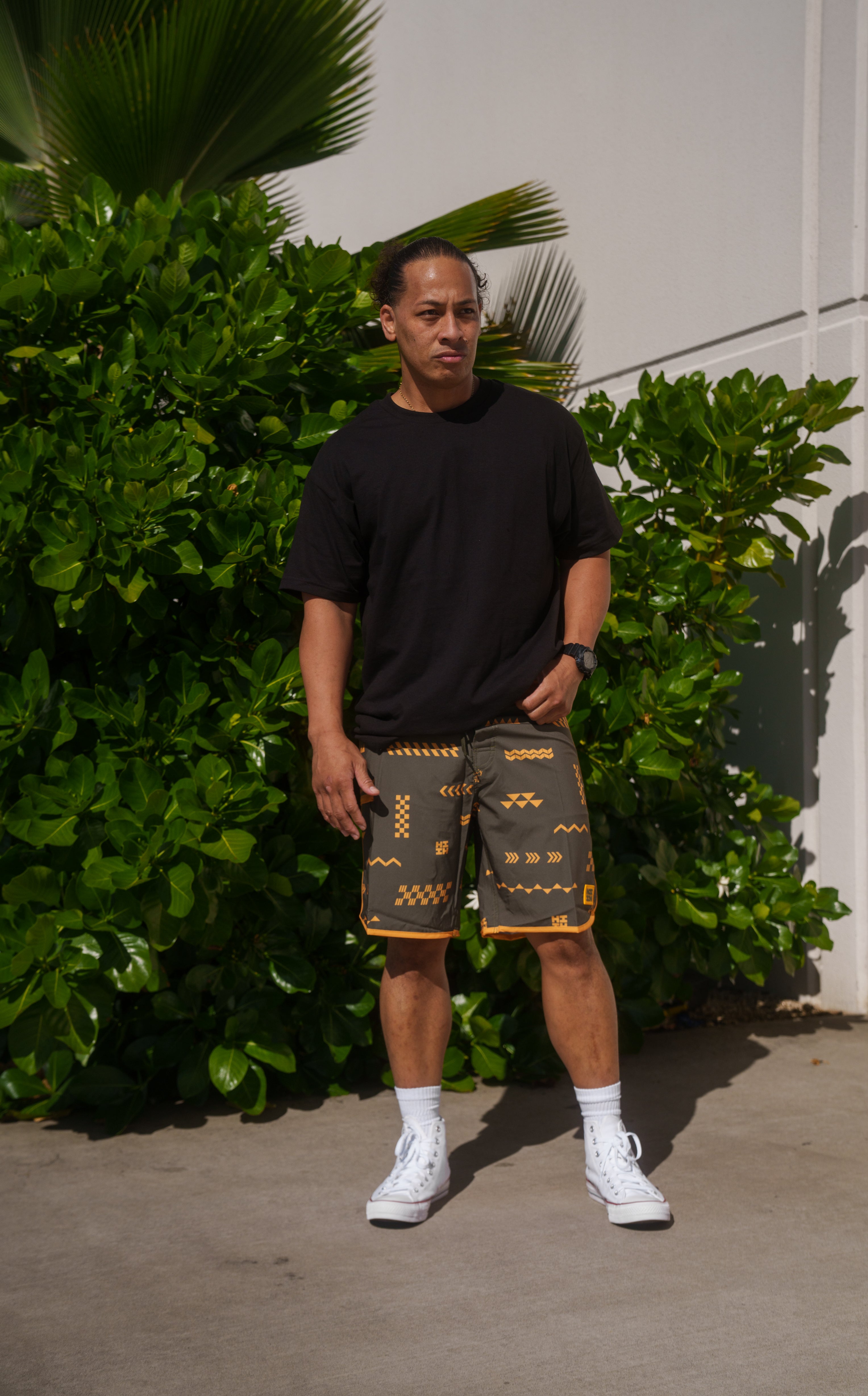 ʻANO KĀPALA OLIVE & ORANGE BOARDSHORTS