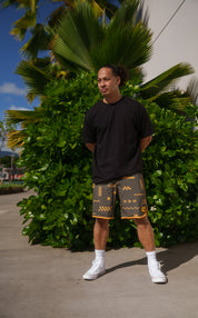 ʻANO KĀPALA OLIVE & ORANGE BOARDSHORTS