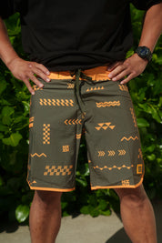 ʻANO KĀPALA OLIVE & ORANGE BOARDSHORTS