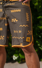 ʻANO KĀPALA OLIVE & ORANGE BOARDSHORTS