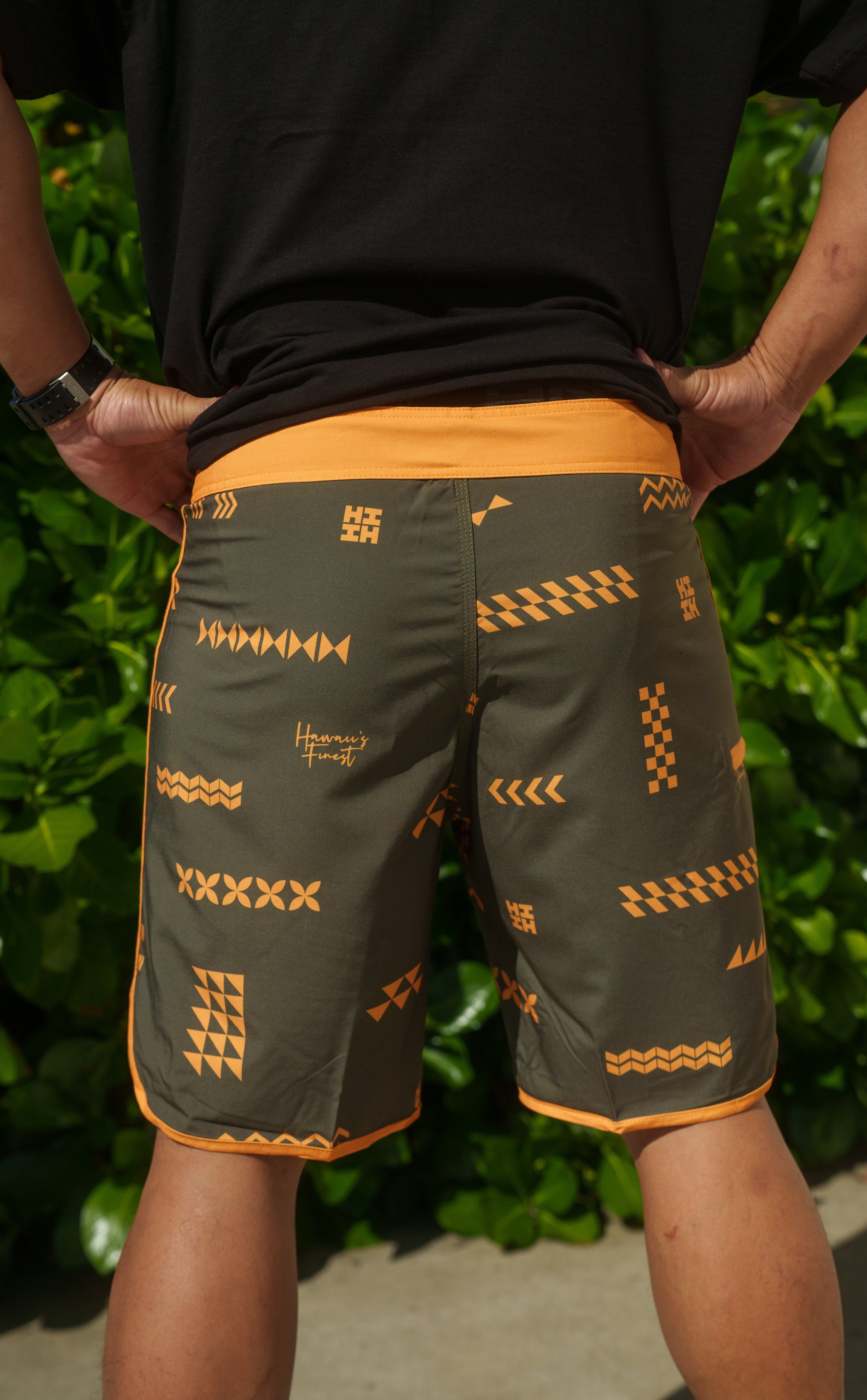 ʻANO KĀPALA OLIVE & ORANGE BOARDSHORTS