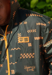 ʻANO KĀPALA OLIVE & ORANGE WINDBREAKER