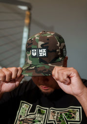 CAMO SIMPLE LOGO TRUCKER Hat Hawaii's Finest 