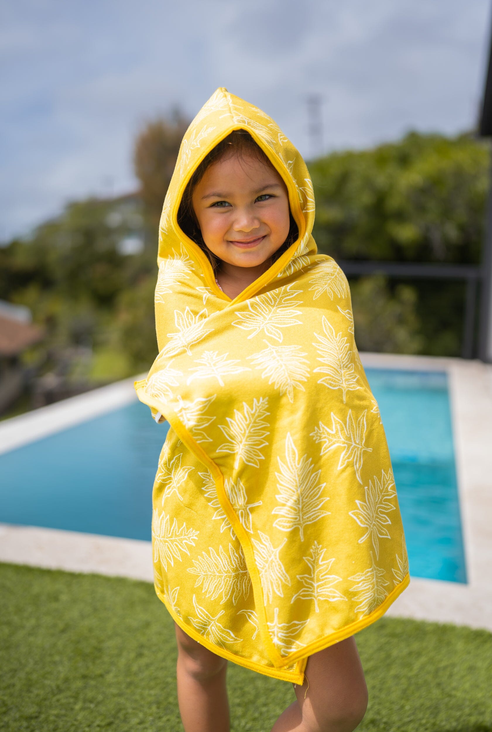 https://shop.hifinest.com/cdn/shop/products/keiki-poncho-yellow-lauae-towel-utility-hawaiis-finest-small-291167_1681x.jpg?v=1677543166